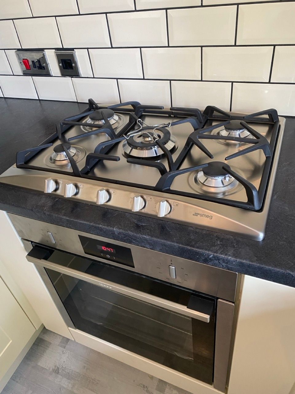 Freshly installed stainless steel gas hob